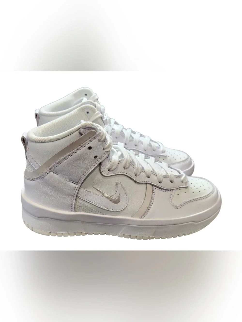 Nike used excellent